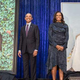 Portraits of Barack and Michelle Obama are unveiled Monday at the National Portrait Gallery. They are flanked by artists Kehinde Wiley and Amy Sherald. (Credit: National Portrait Gallery)
